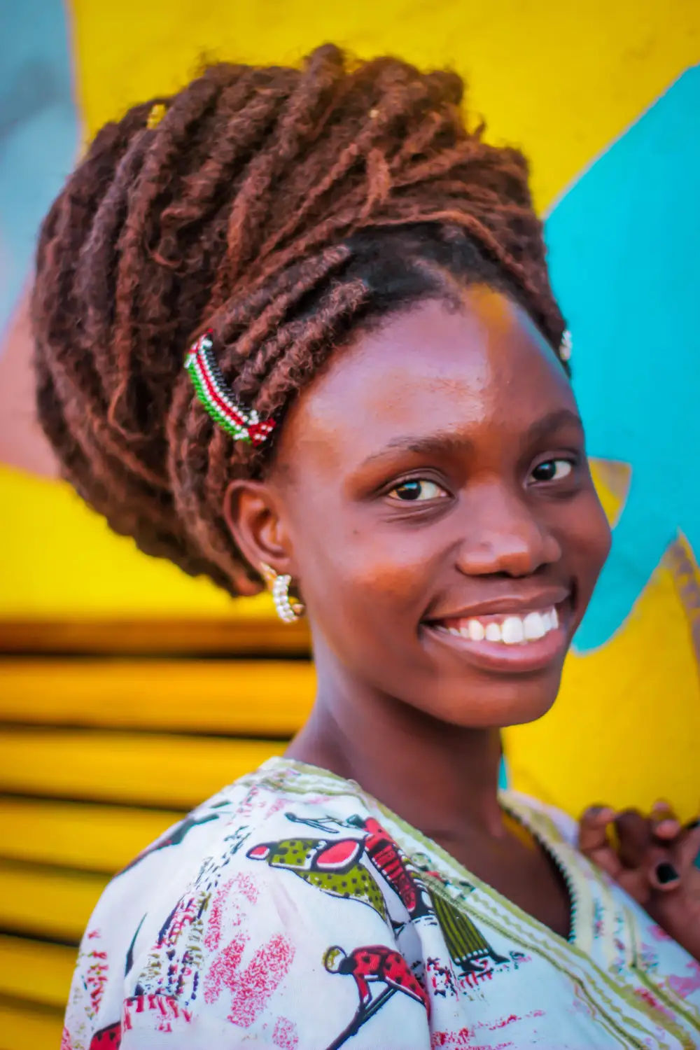 Girl smiling widely at the camera
