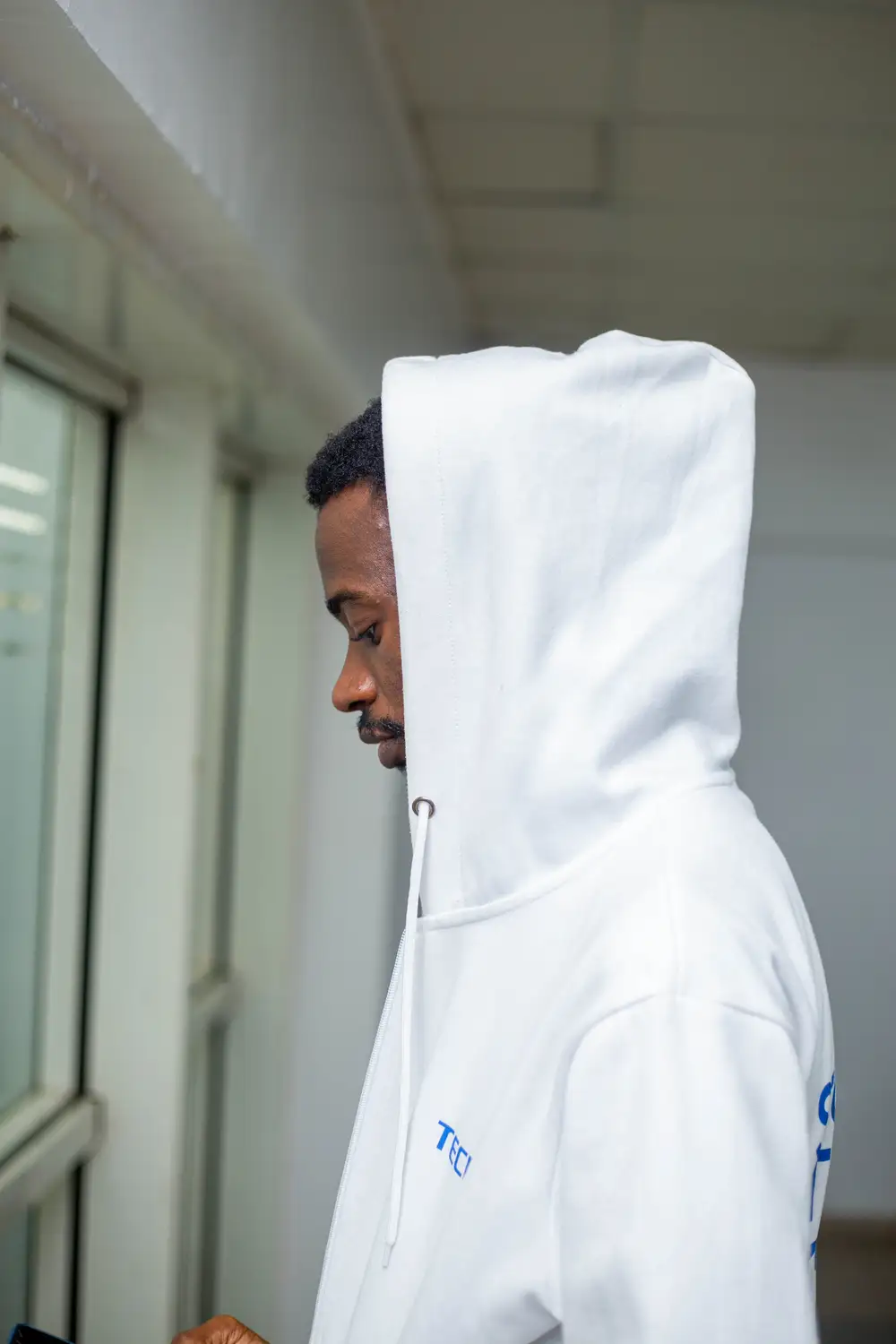 man on white hoodie