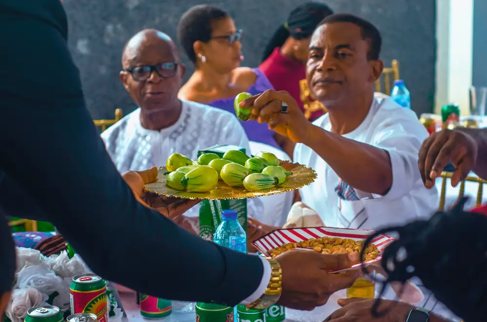 Man picking a garden egg