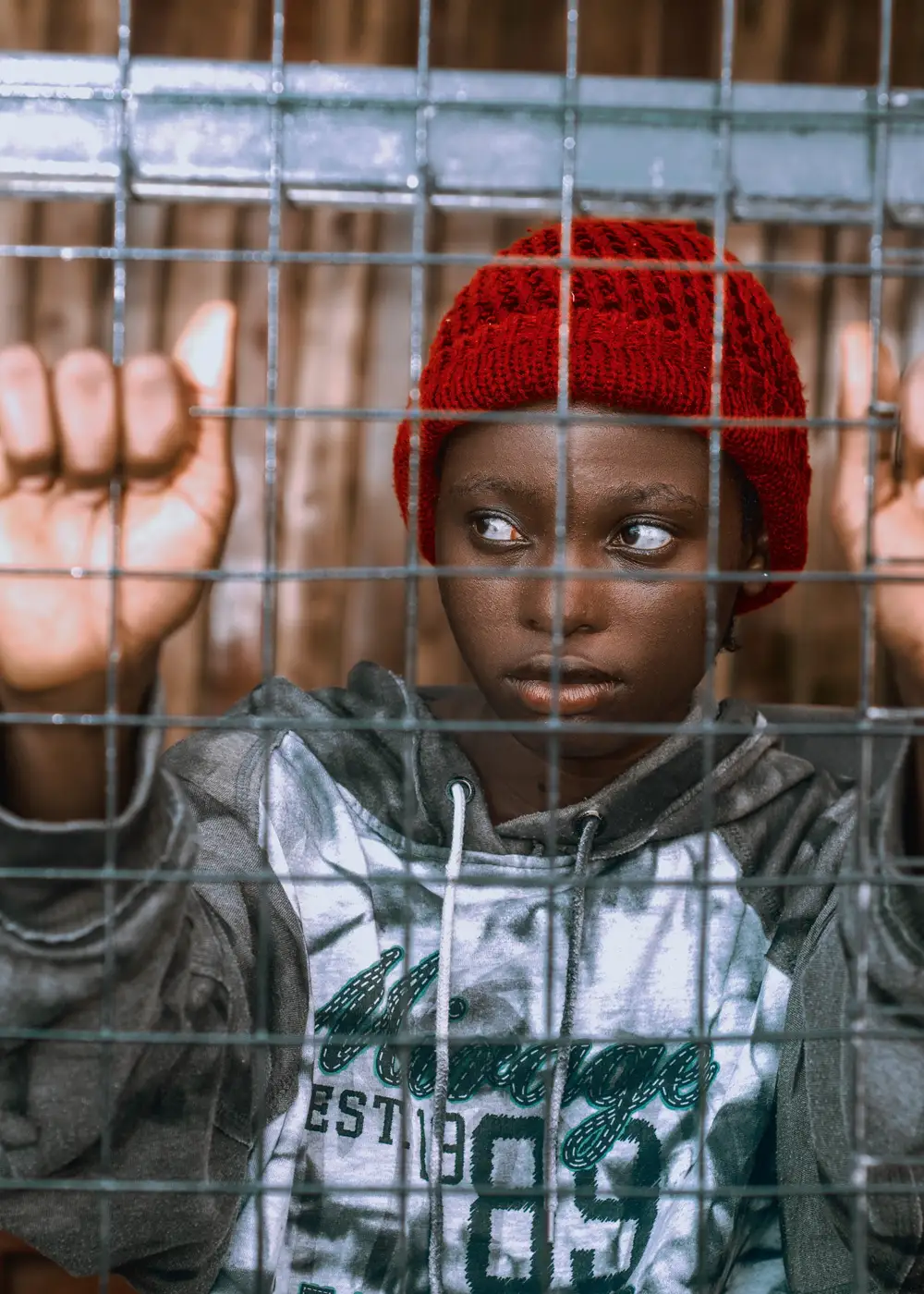 Girl holding a cage