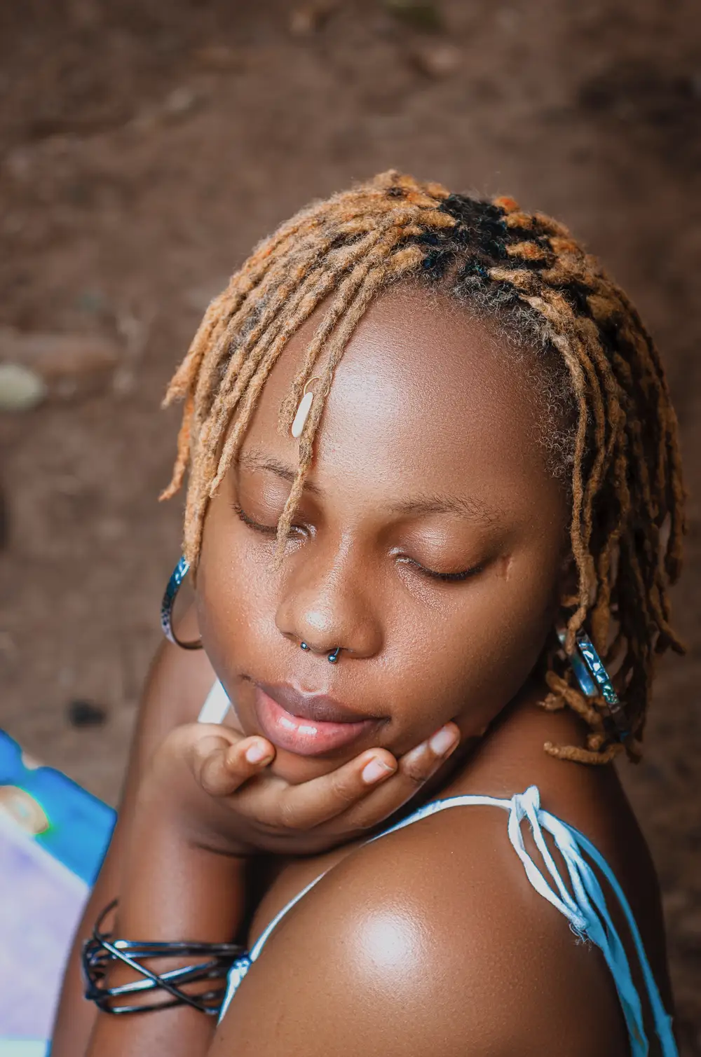 Lady holding her jaw