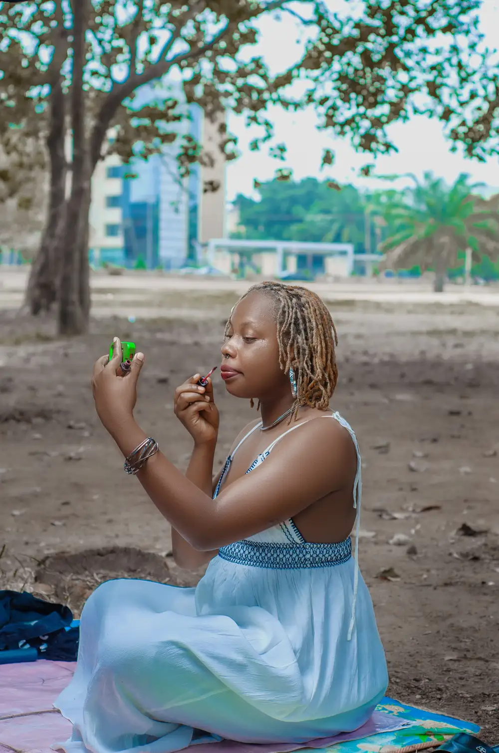 Girl with green phone pouch