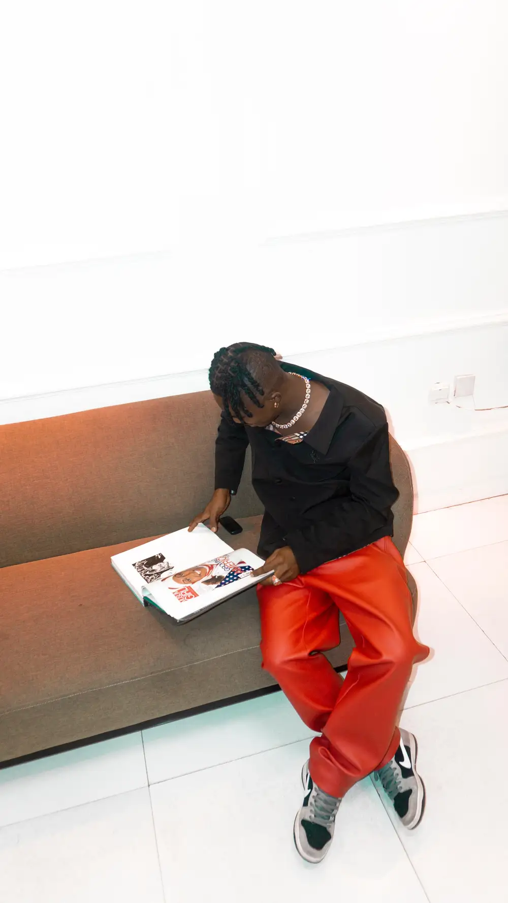 Guy reading a magazine