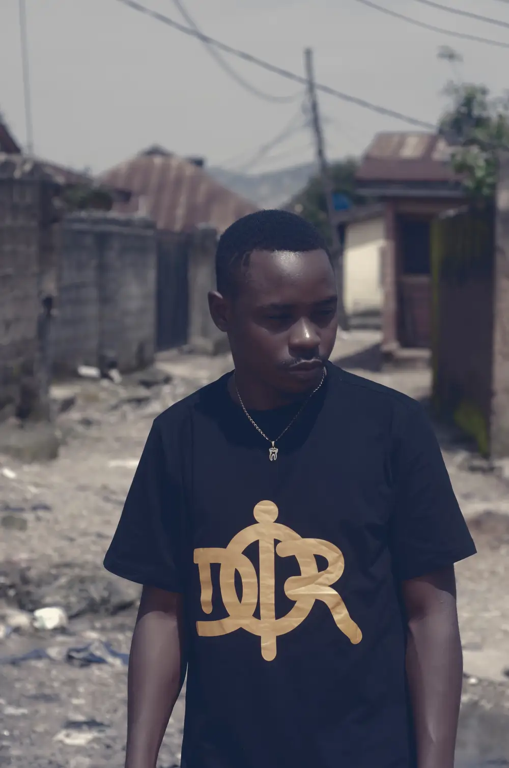 Guy in a black and yellow shirt