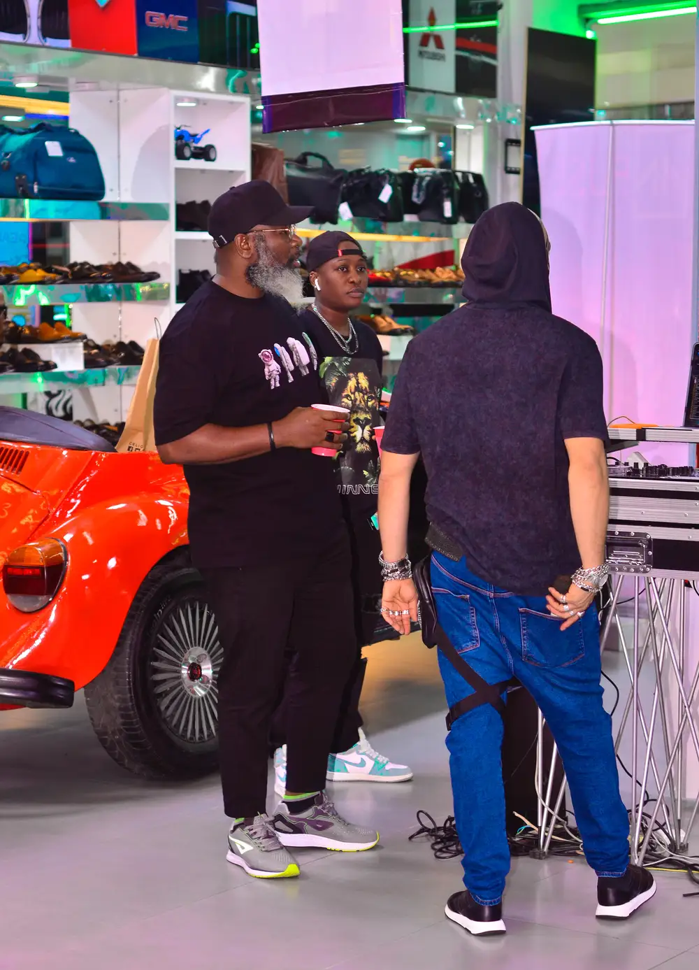 Two guys and a lady talking