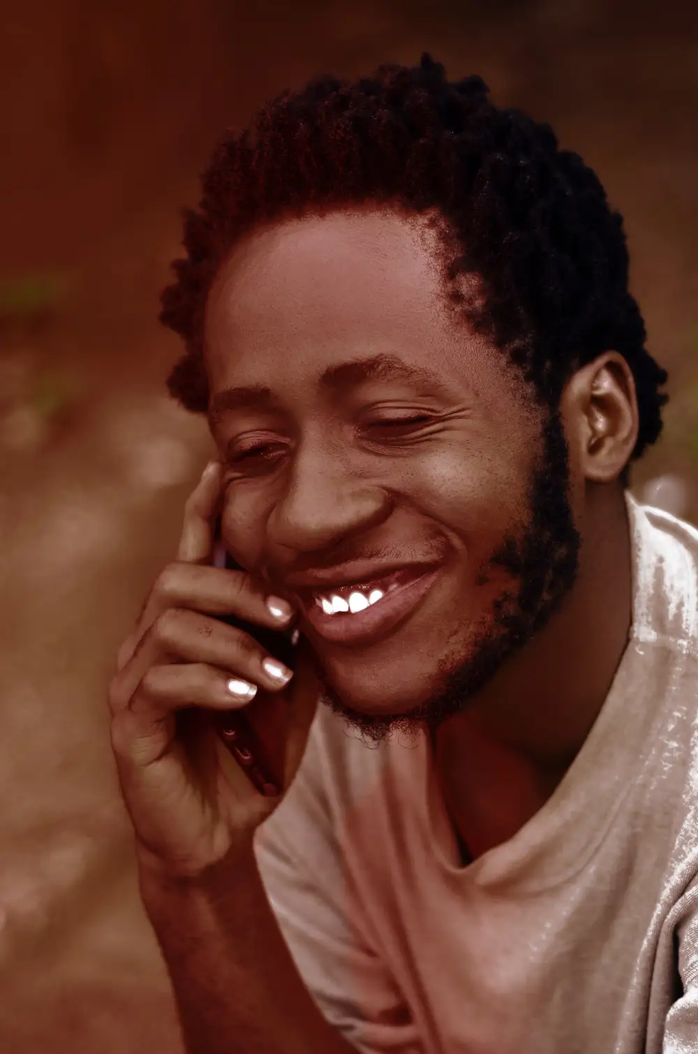 Man smiling on a call