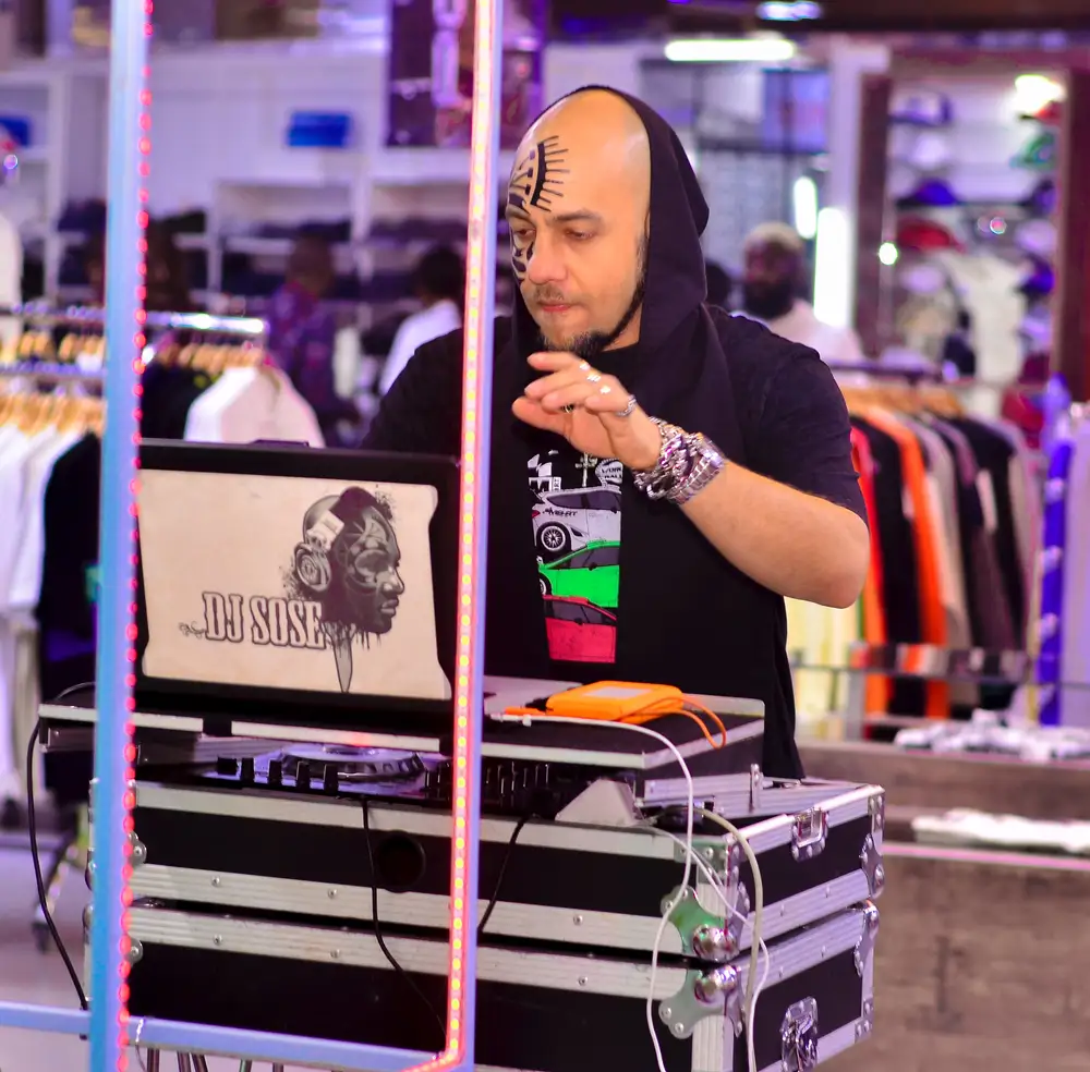 DJ Sose operating his laptop