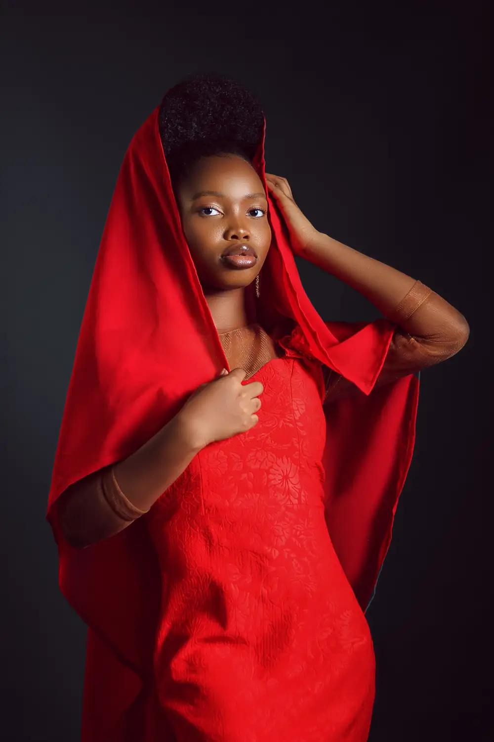 Young lady in red posing