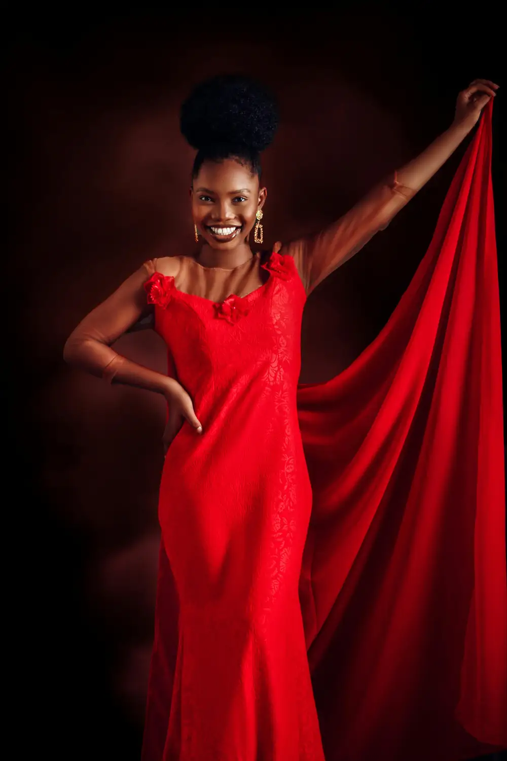 Smiling lady wearing red dress