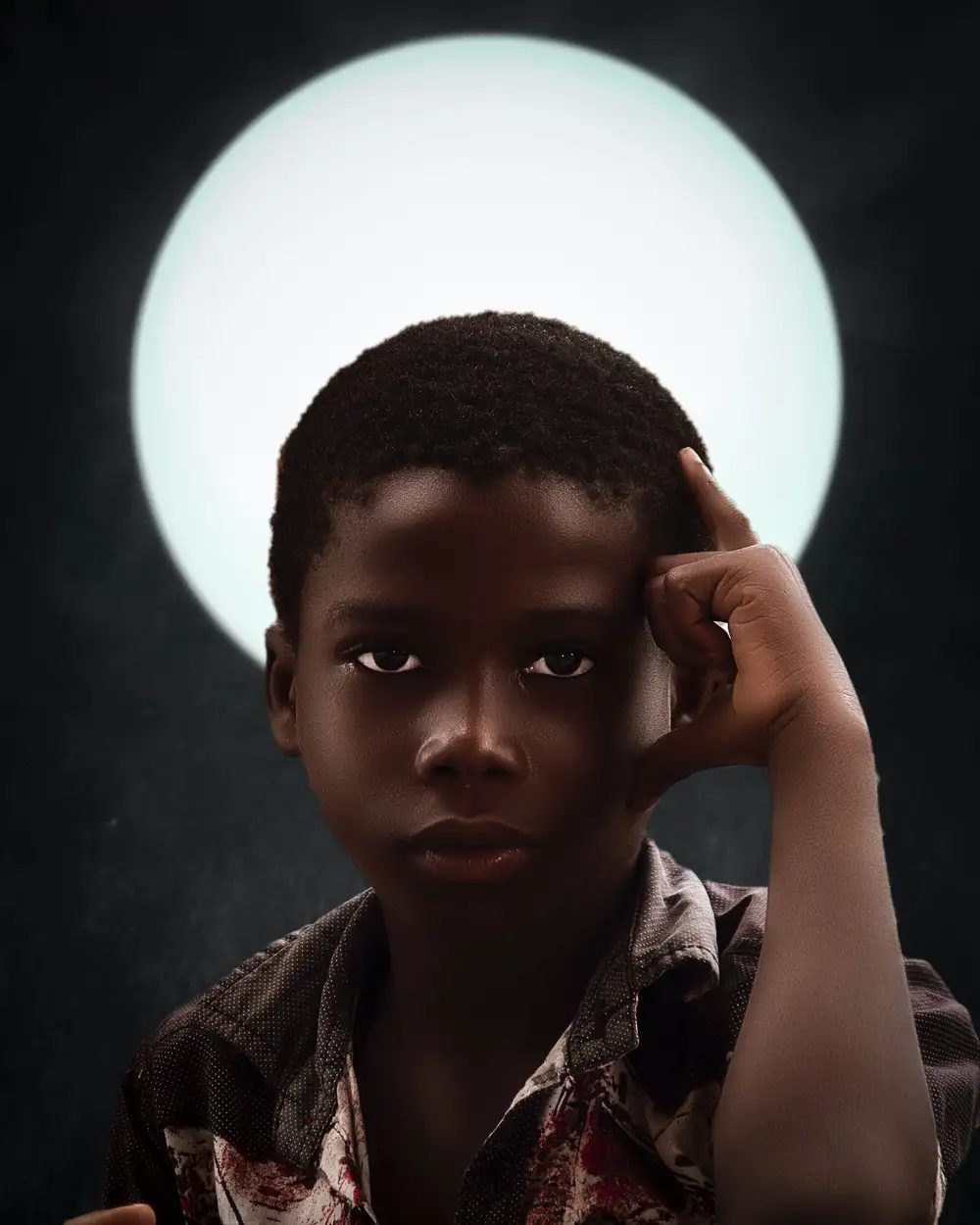 Portrait of a young black boy