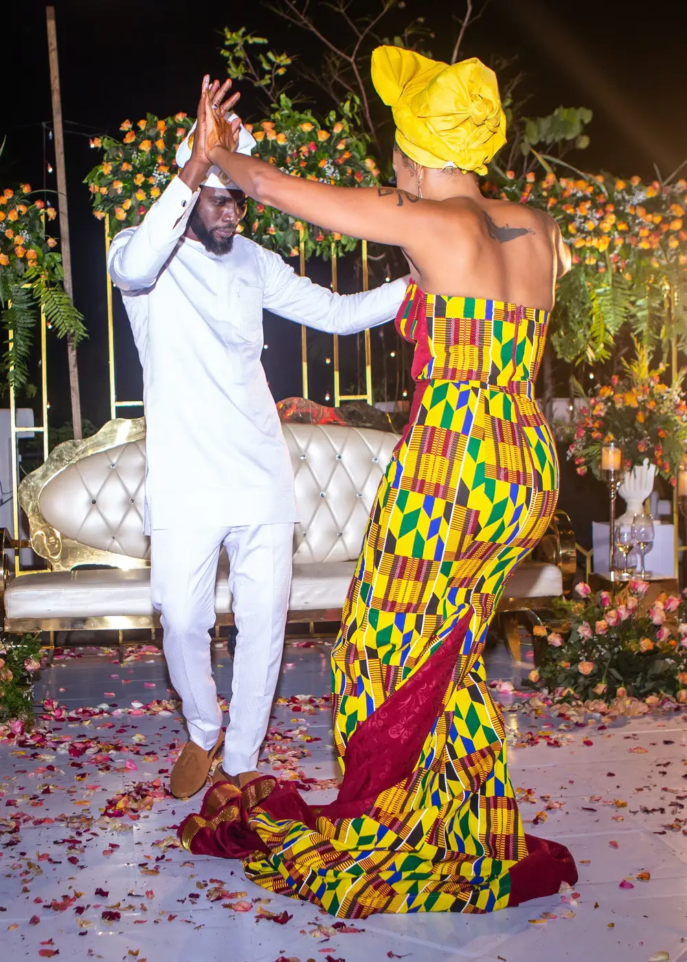 groom and friend dancing