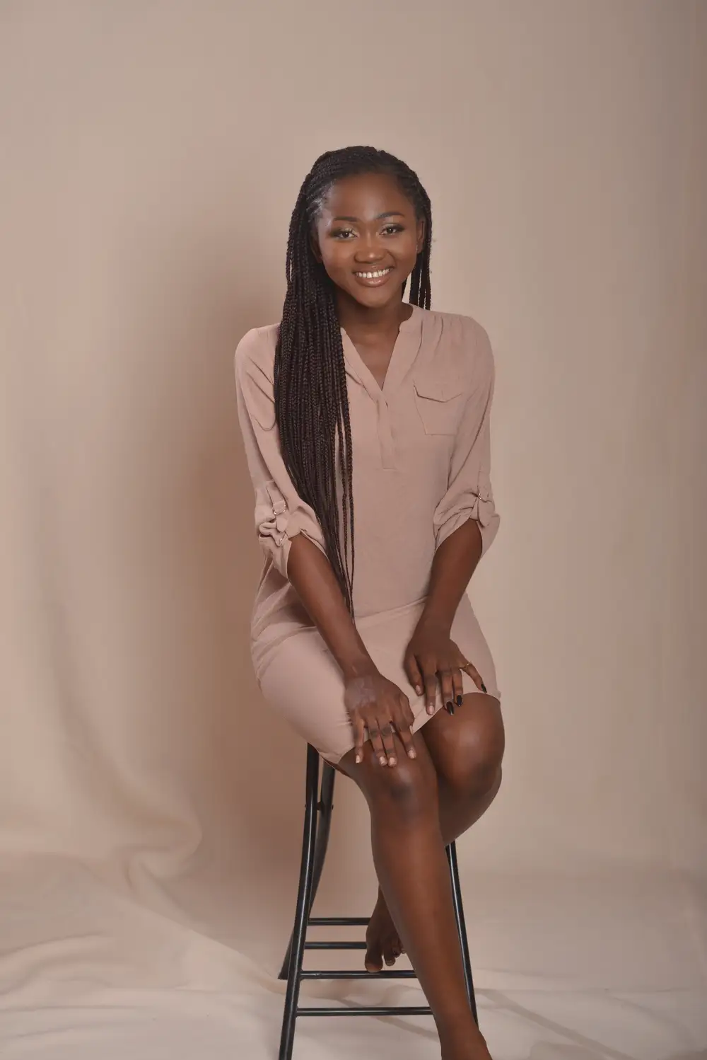 woman posing on chair