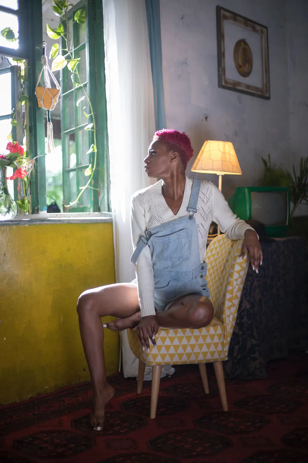 woman posing on chair