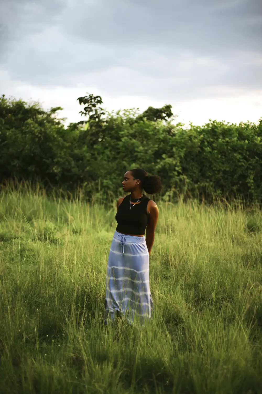 Girl standing on grass