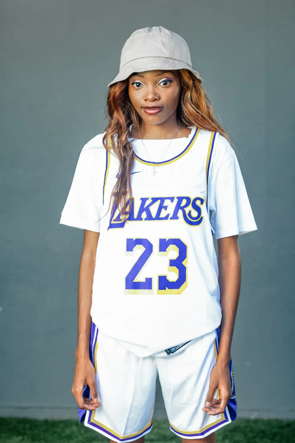 lady in white lakers jersey