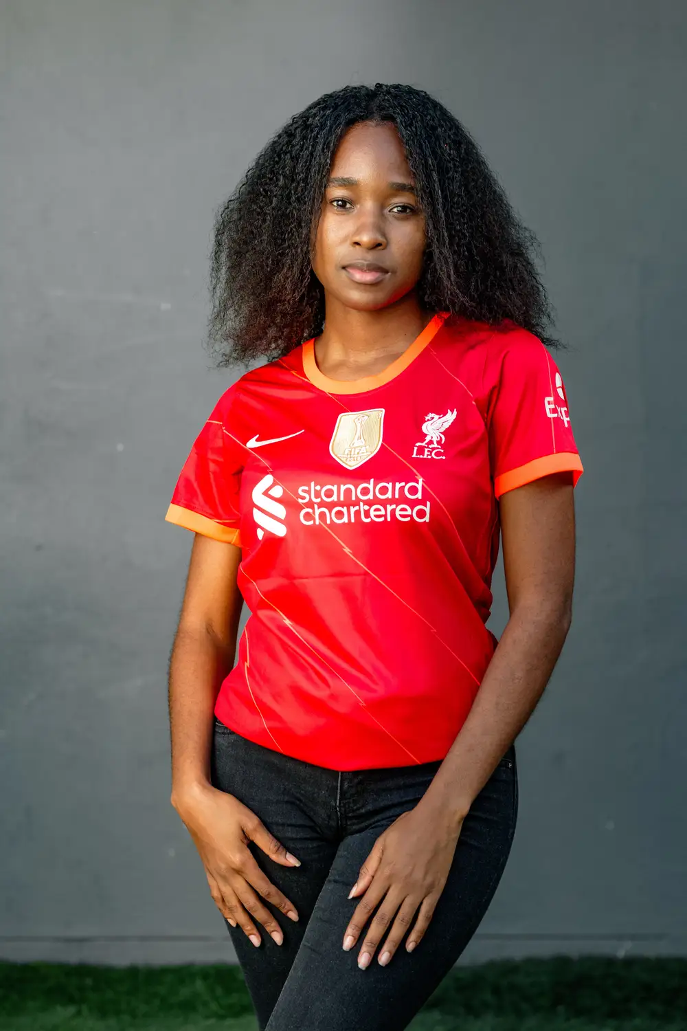 girl in red liverpool jersey