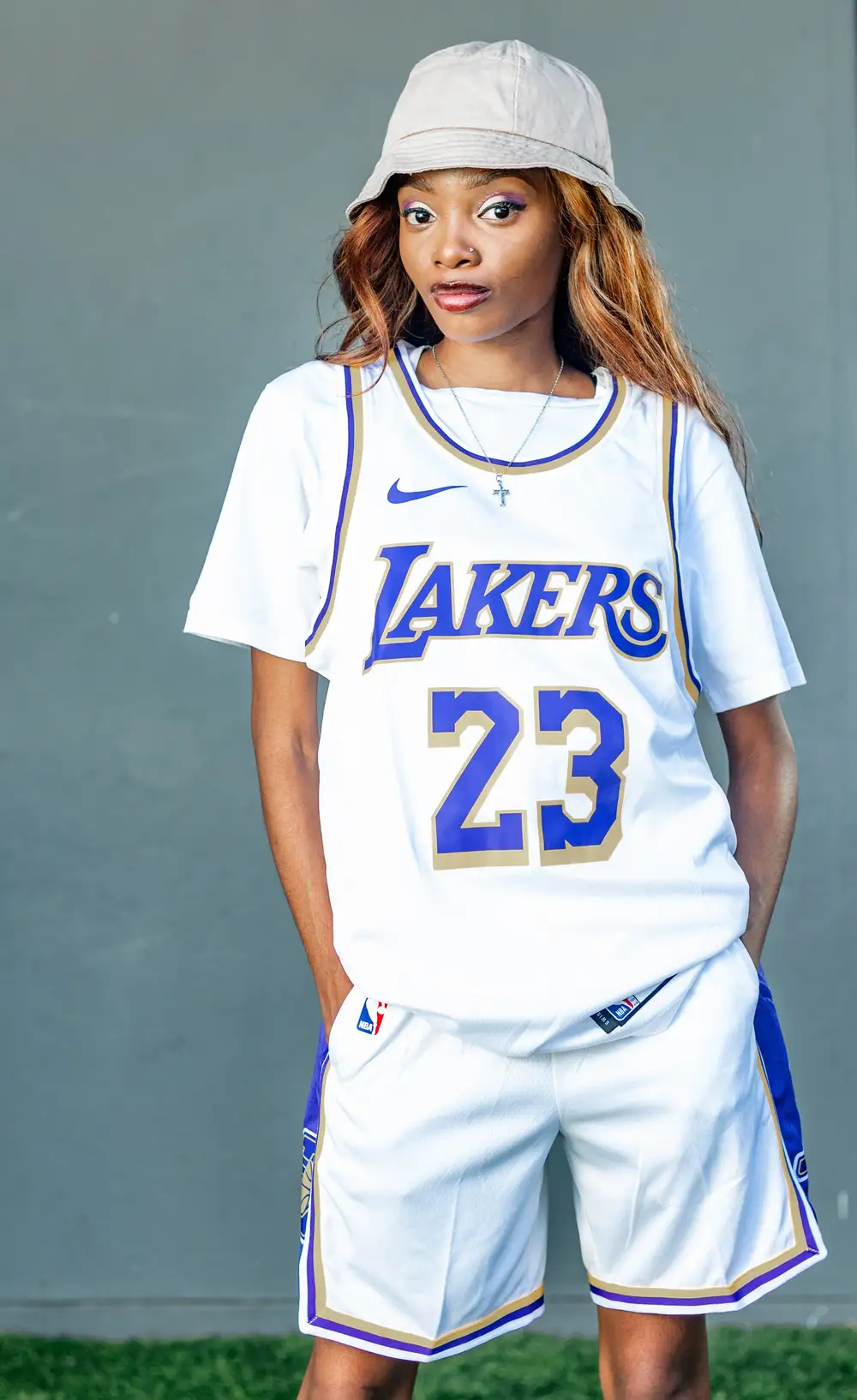 girl in white lakers jersey