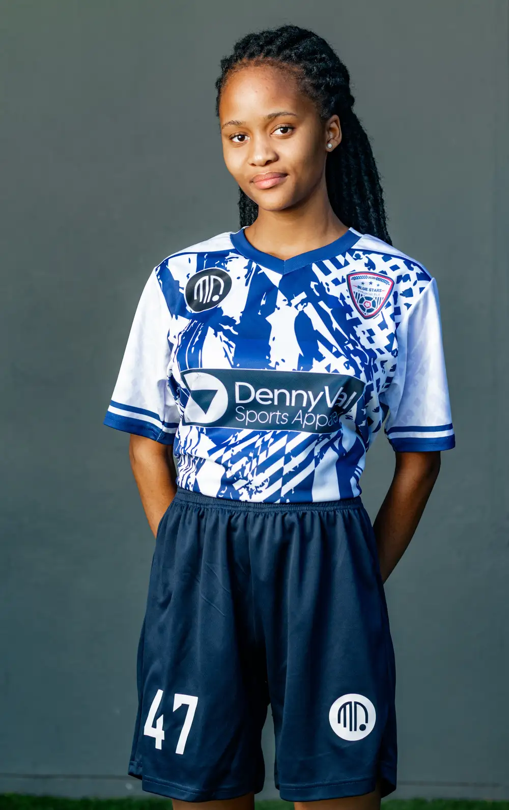 girl in blue and white jersey