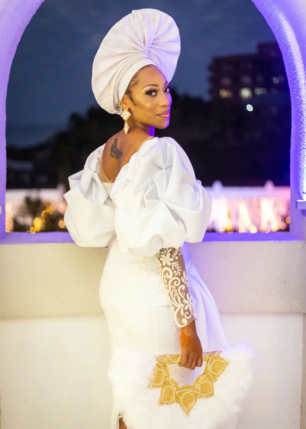 Pretty bride by the  lighted hallway