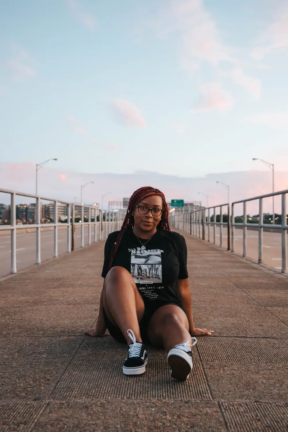 Young lady relaxing on the road