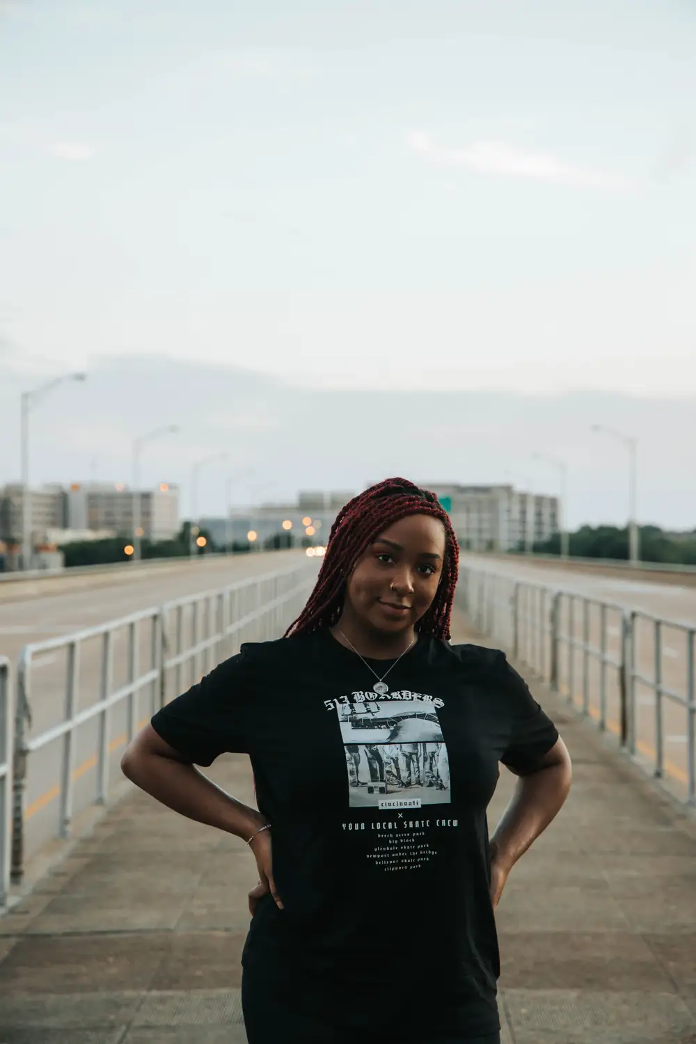 Young lady standing on a walkway