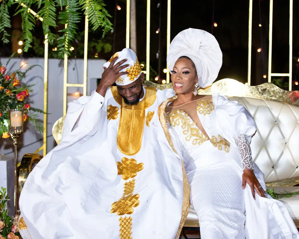 Bride Smiling, groom hand on his hat