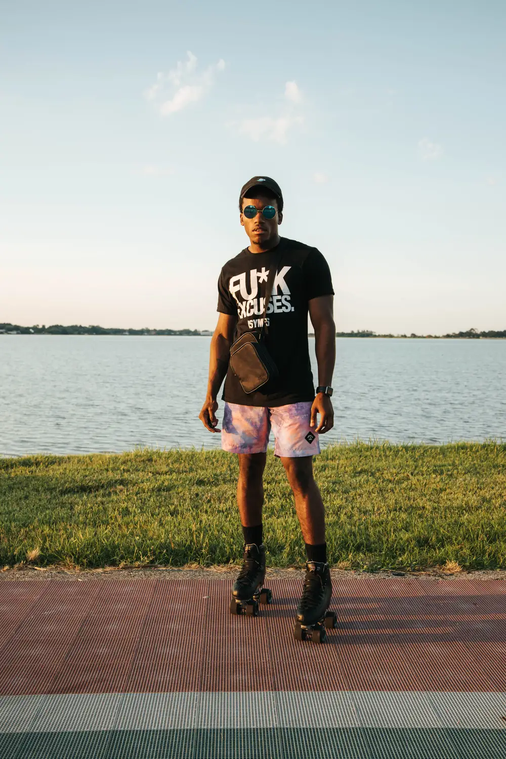 Young black man with a rollerskating shoe on a short