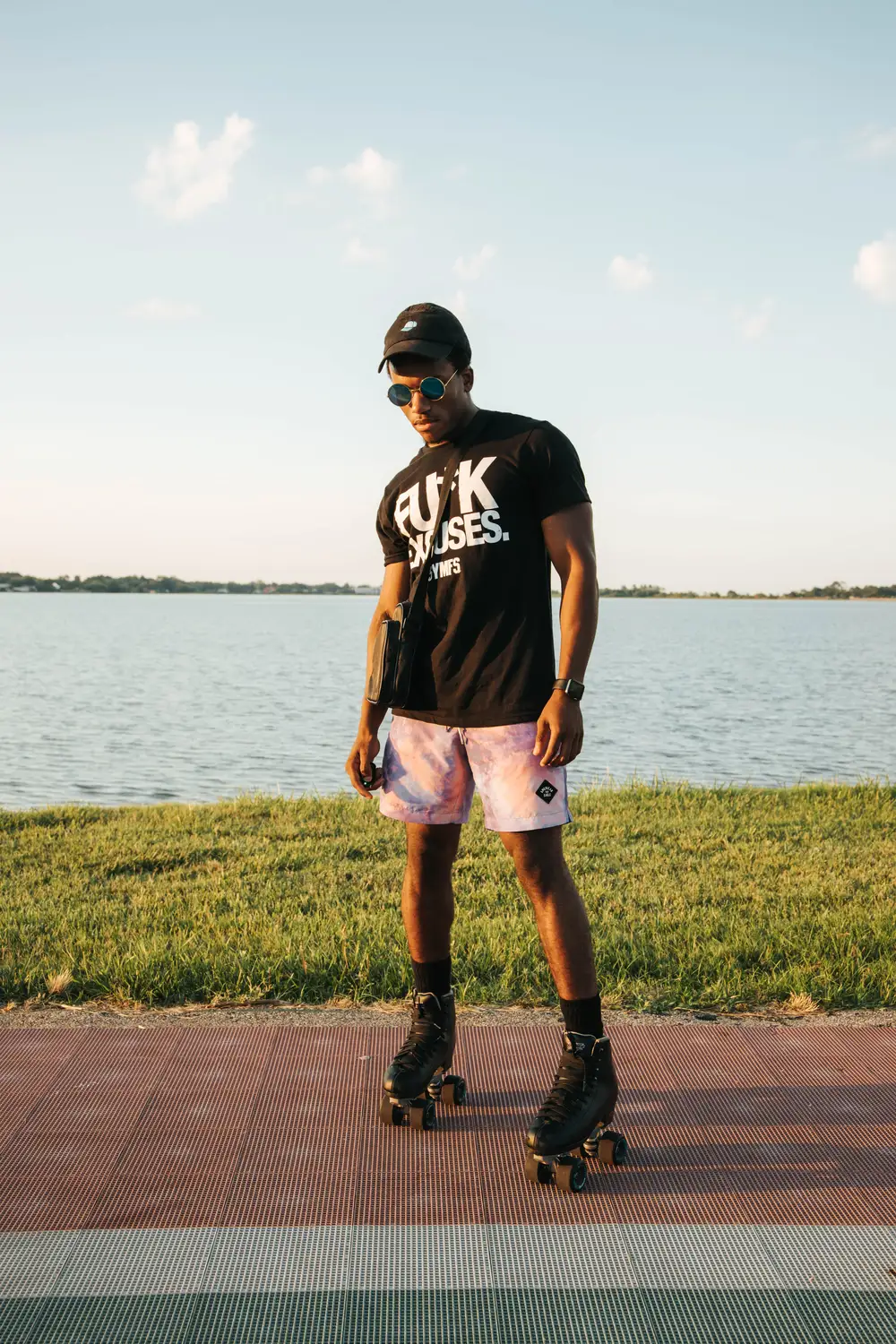 A young black rollerskater posing for a picture