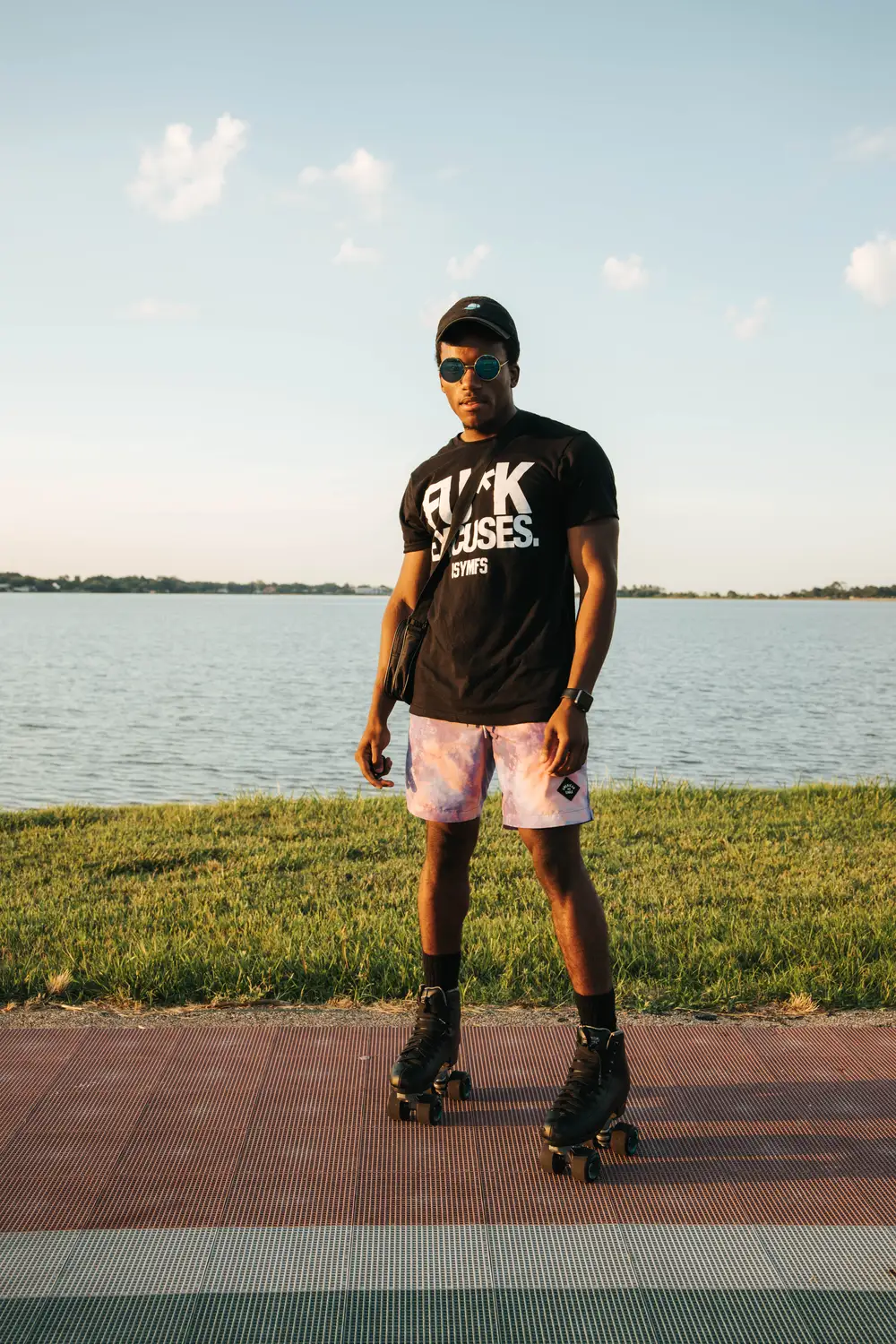 Rollerskater on black shirt and a short by the river