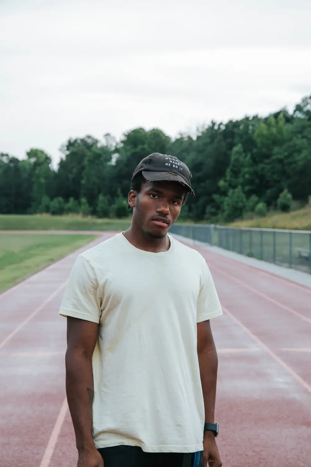 Young man on a race track