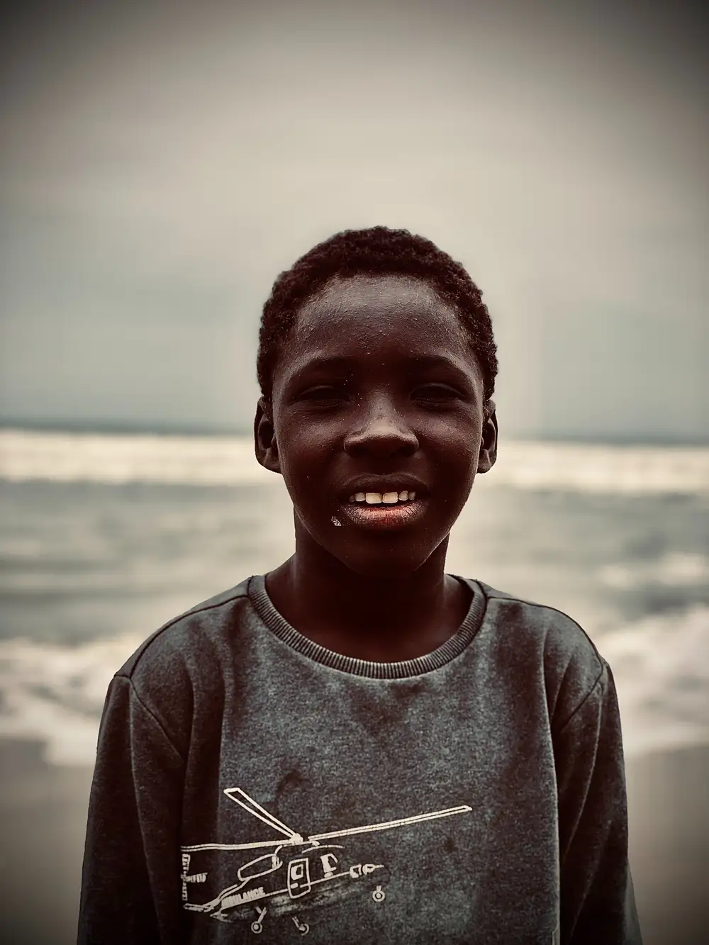 Smiling boy at beach