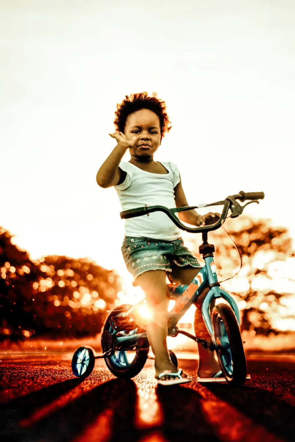 little girl riding a bicycle