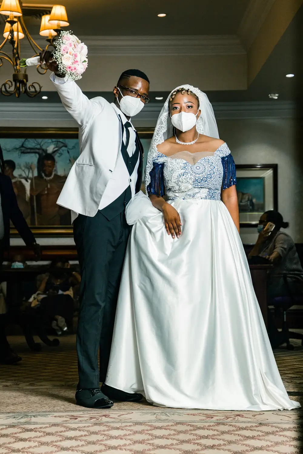 groom and bride on nose mask