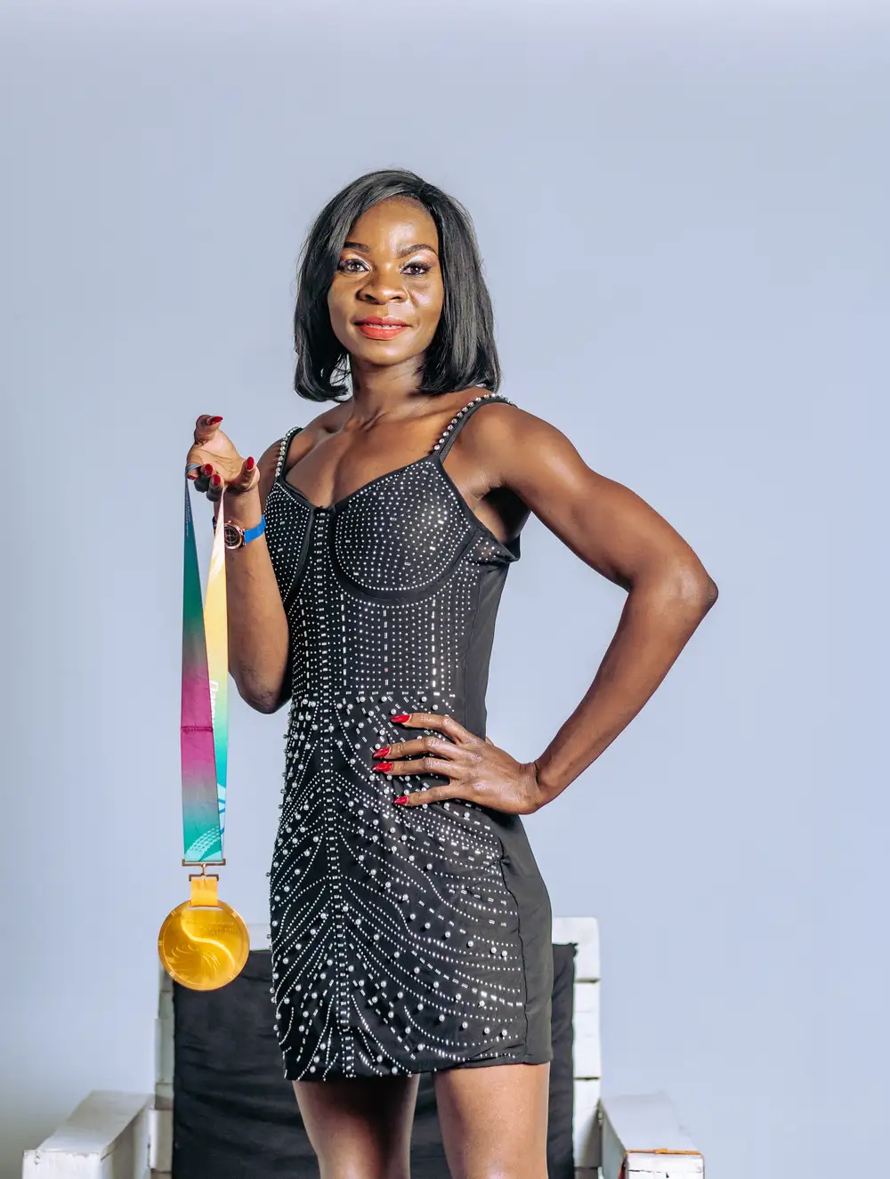 athlete holding her medal