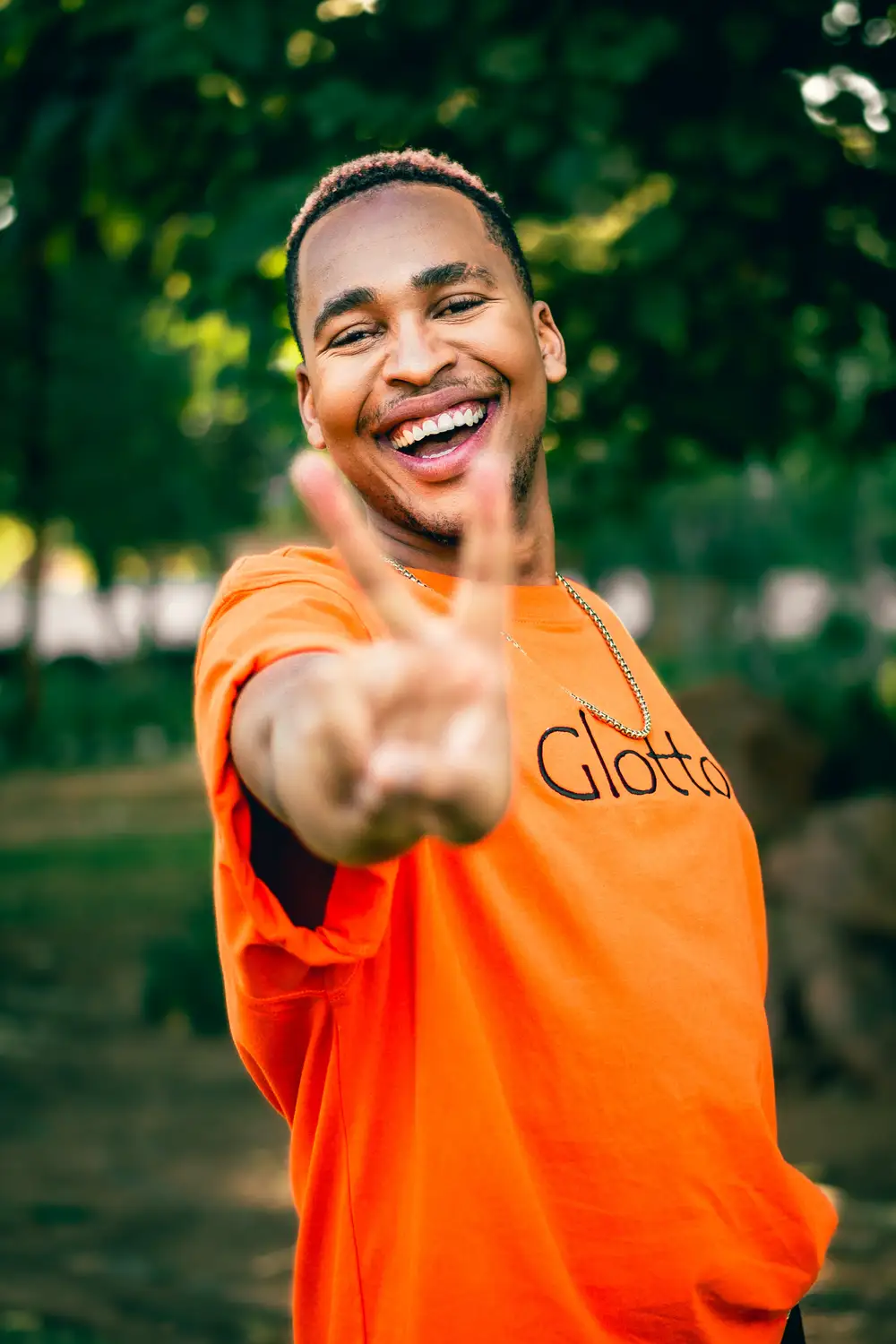 happy man in an orange shirt