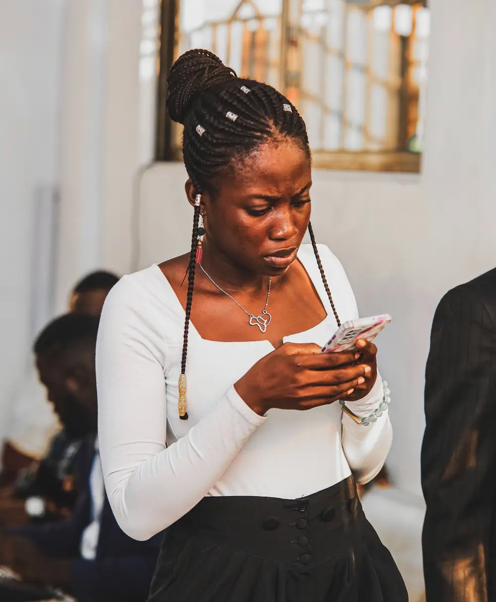 Girl pressing her phone