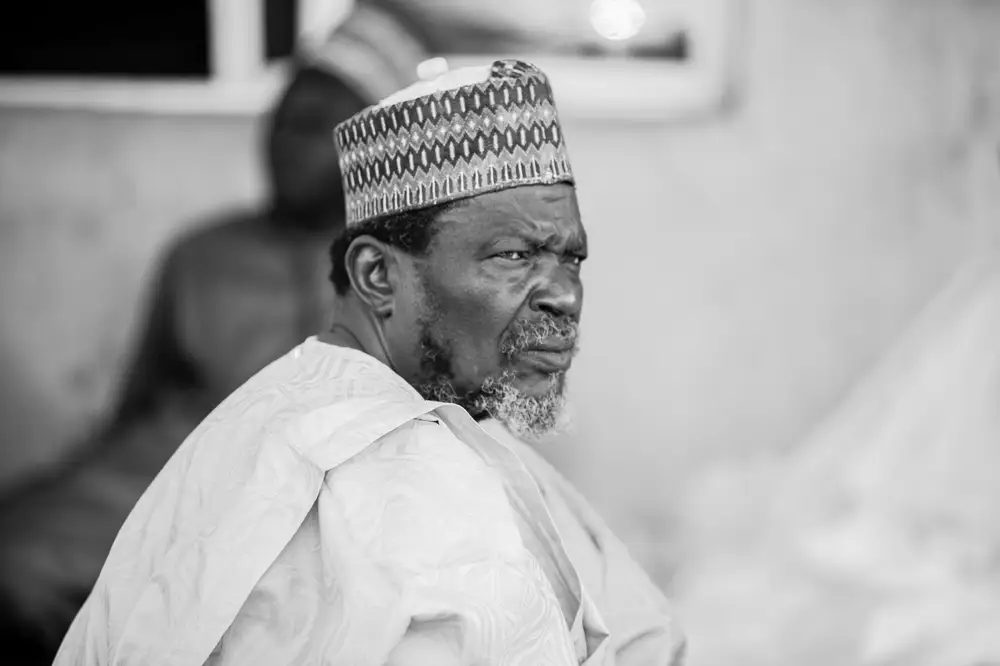 Man looking sideways in a mosque