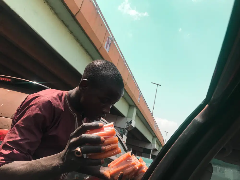 Boy hawking carrots