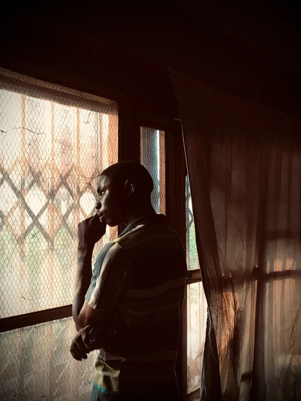 Boy touching his mouth