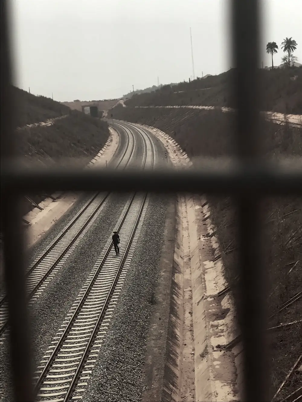 Man walking on a railway