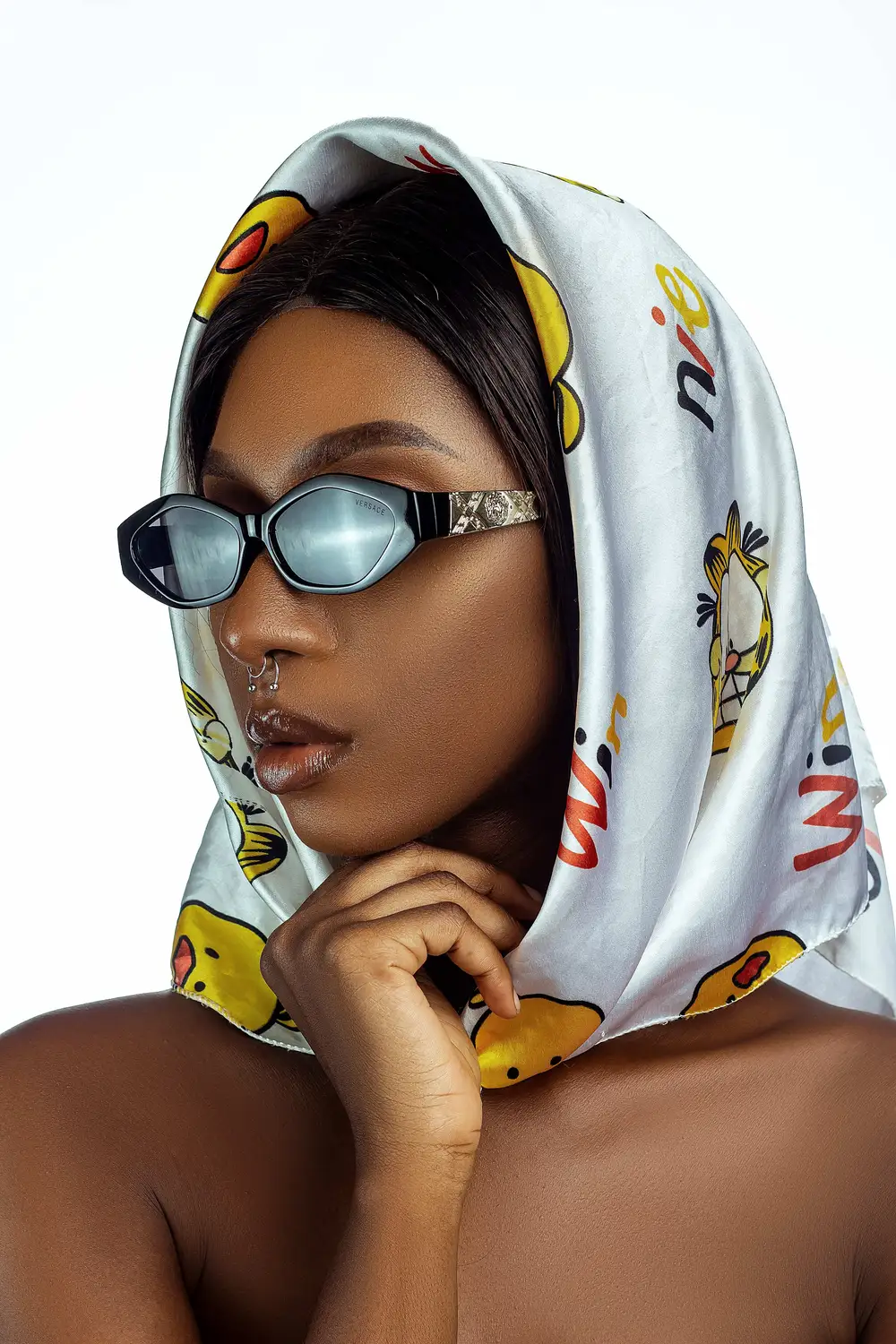 woman with shades and scarf