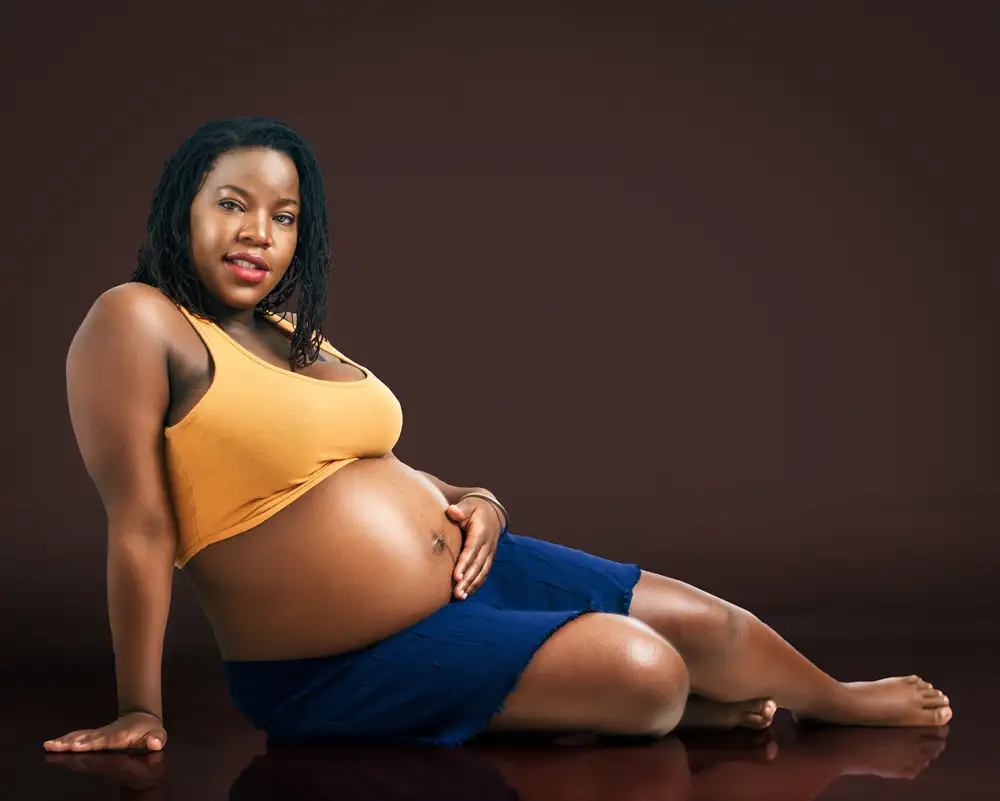 Pregnant woman in yellow and blue