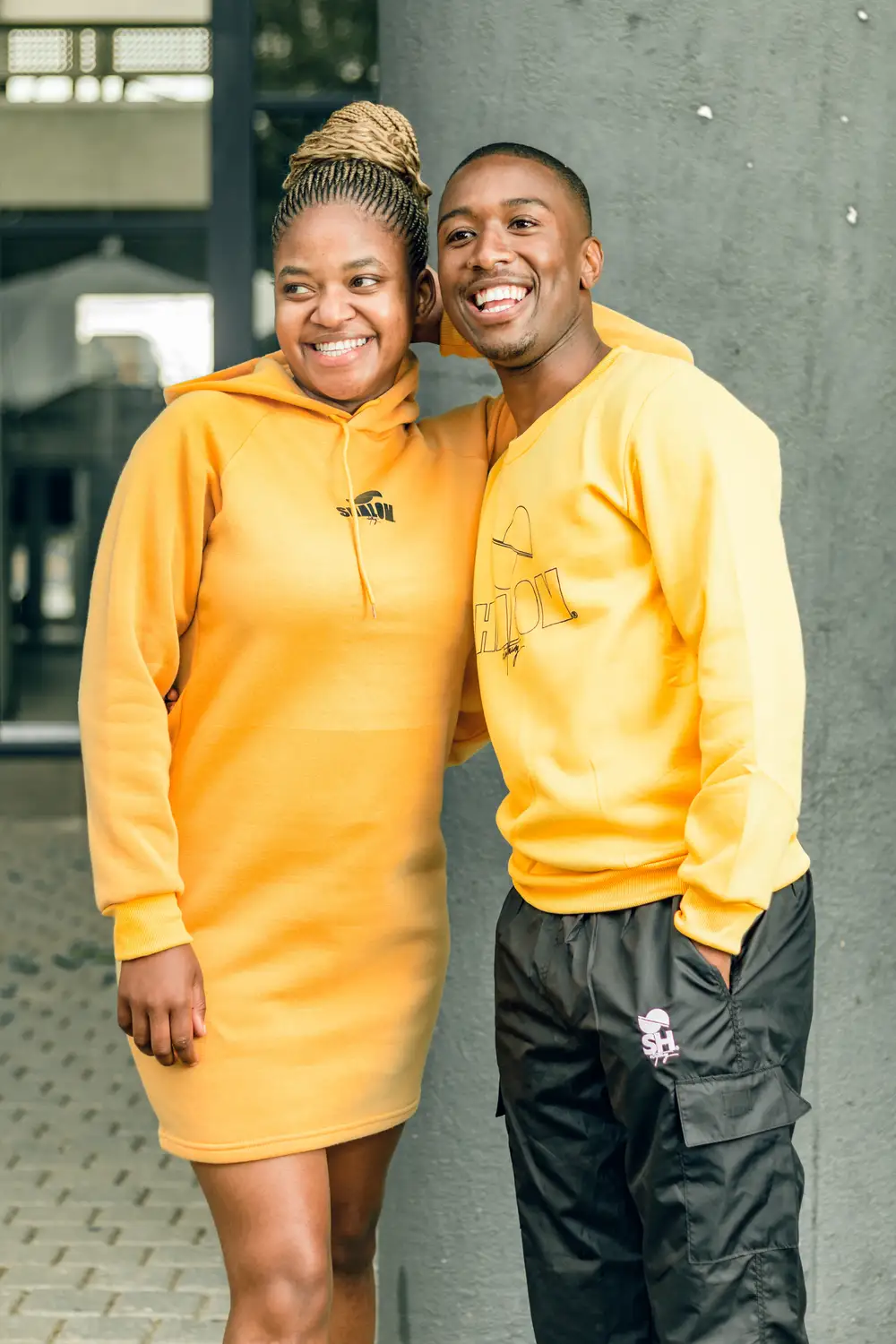 Couple dressed in yellow matching outfits