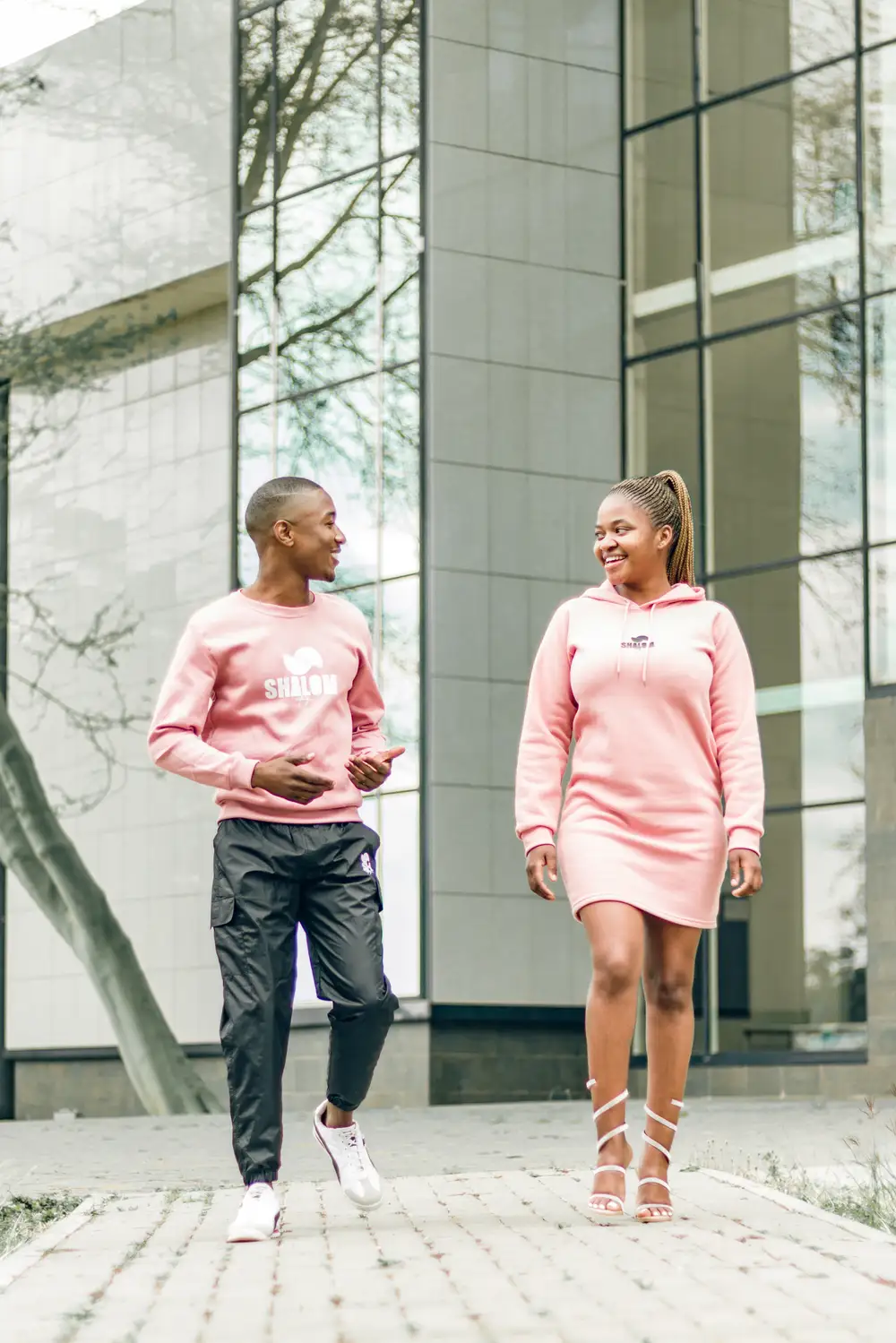 Couple dressed in pink matching outfits