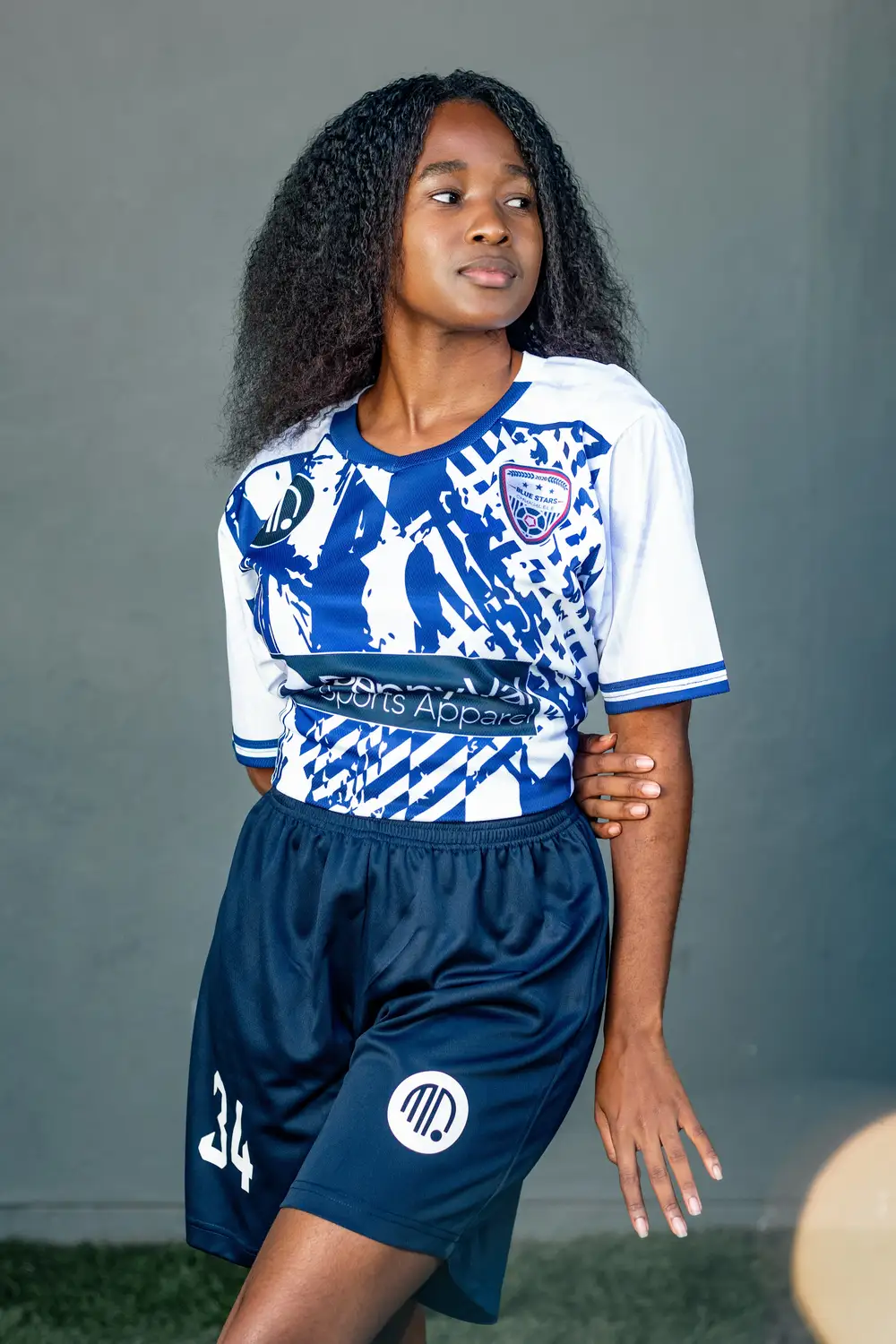 Lady in a blue stars jersey