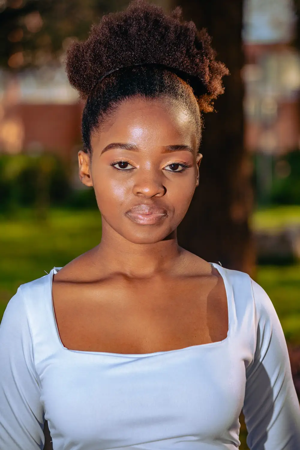 Beautiful young girl in white