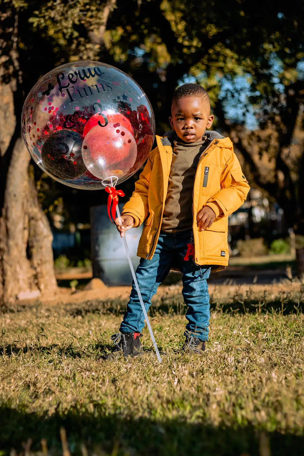 Child holding a balloon