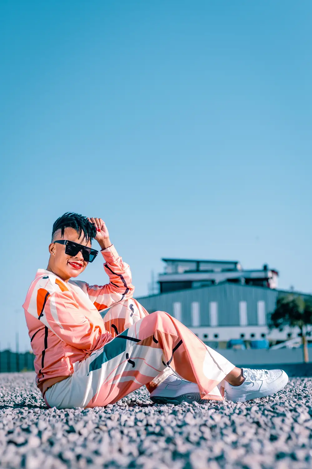 Lady sitting on the street