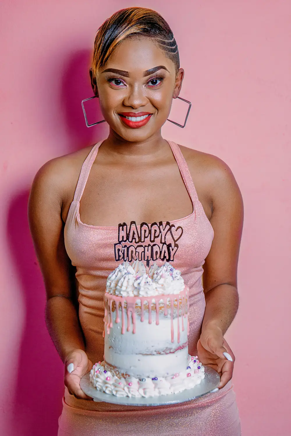 Girl holding her birthday cake