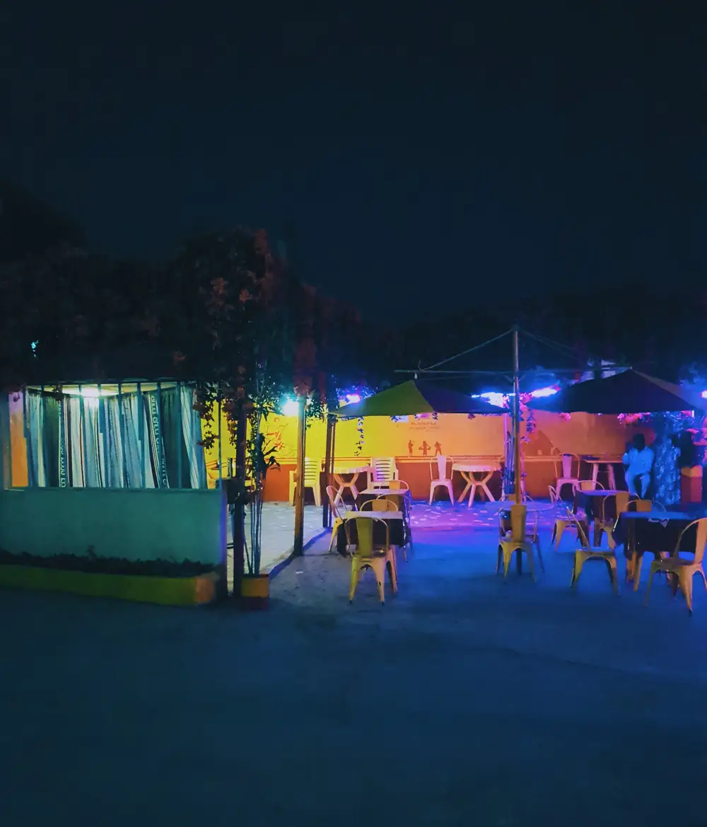 An outdoor lounge at night